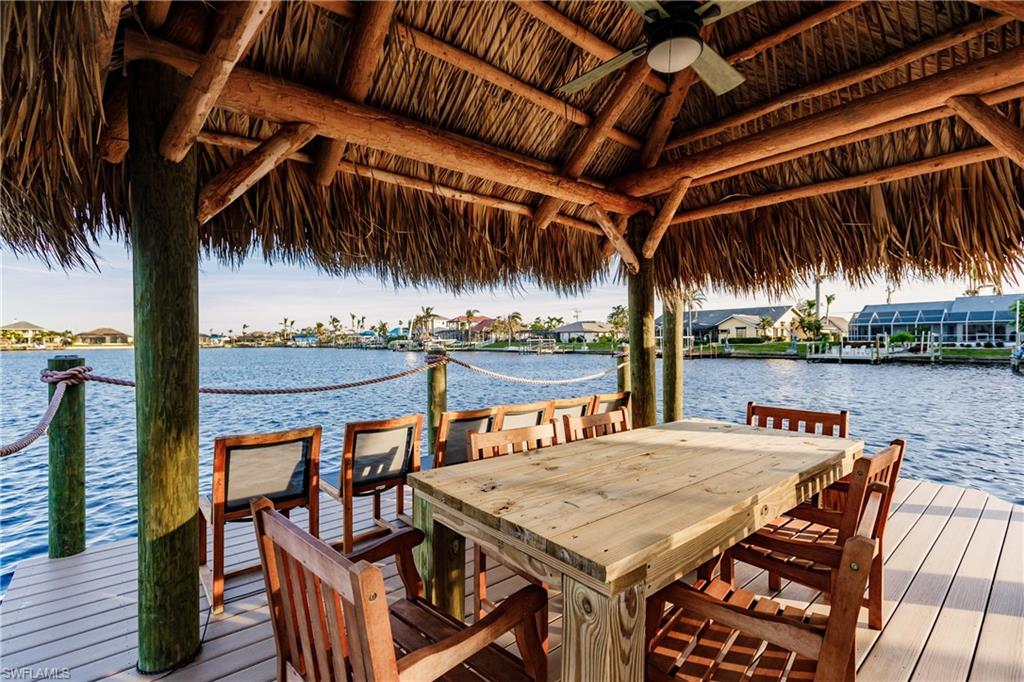 Dock featuring a water view and a gazebo