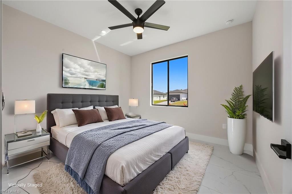 Bedroom with baseboards and ceiling fan