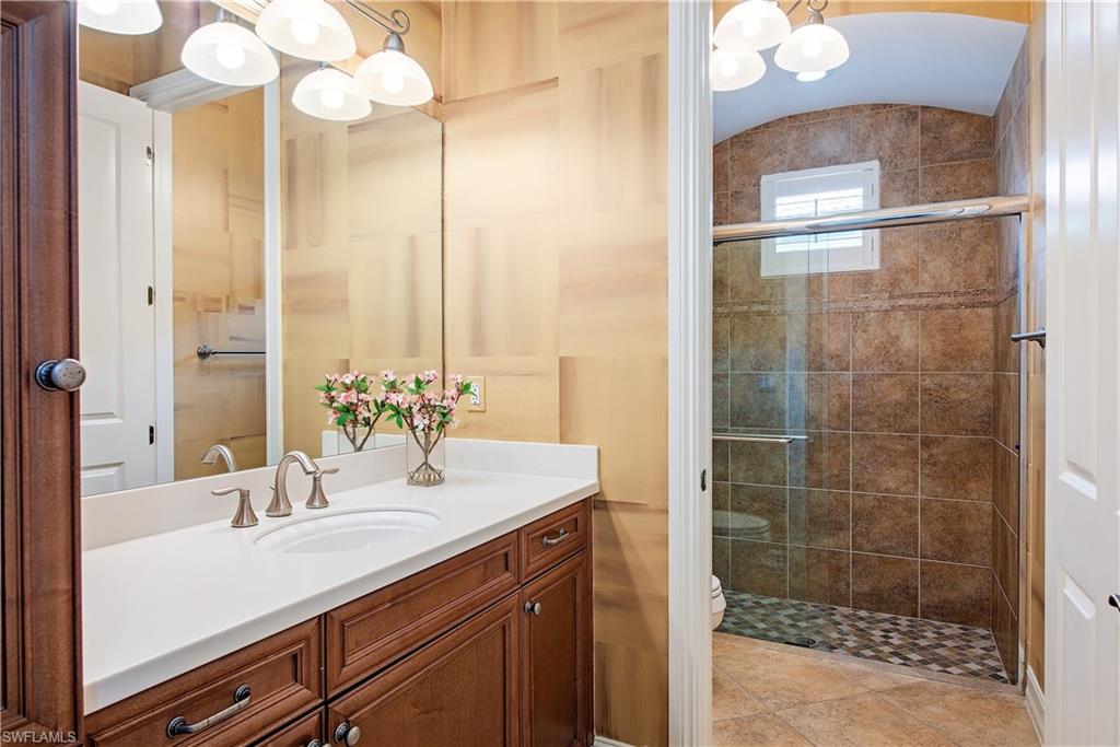 Bathroom with separate shower.