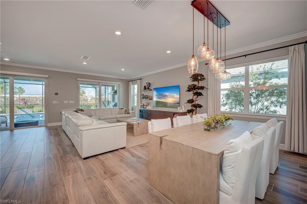Dining area with great light from the windows and pendant lighting