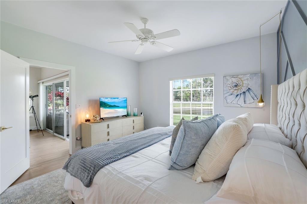 Bedroom featuring ceiling fan and wood finished floors