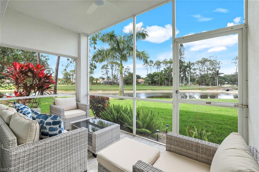 Sunroom / solarium featuring outdoor lounge area, a water view, and ceiling fan
