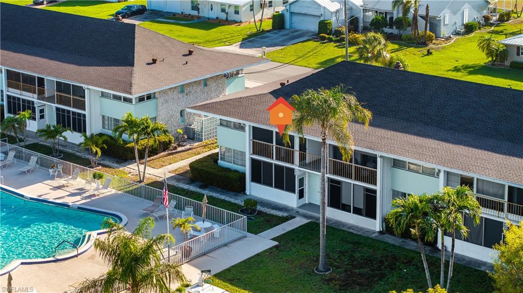 Aerial community pool view from condo patio.