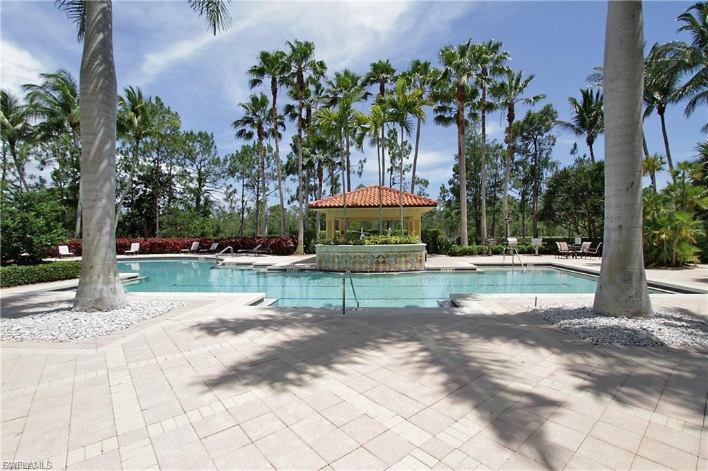 Community pool featuring a patio area and a gazebo