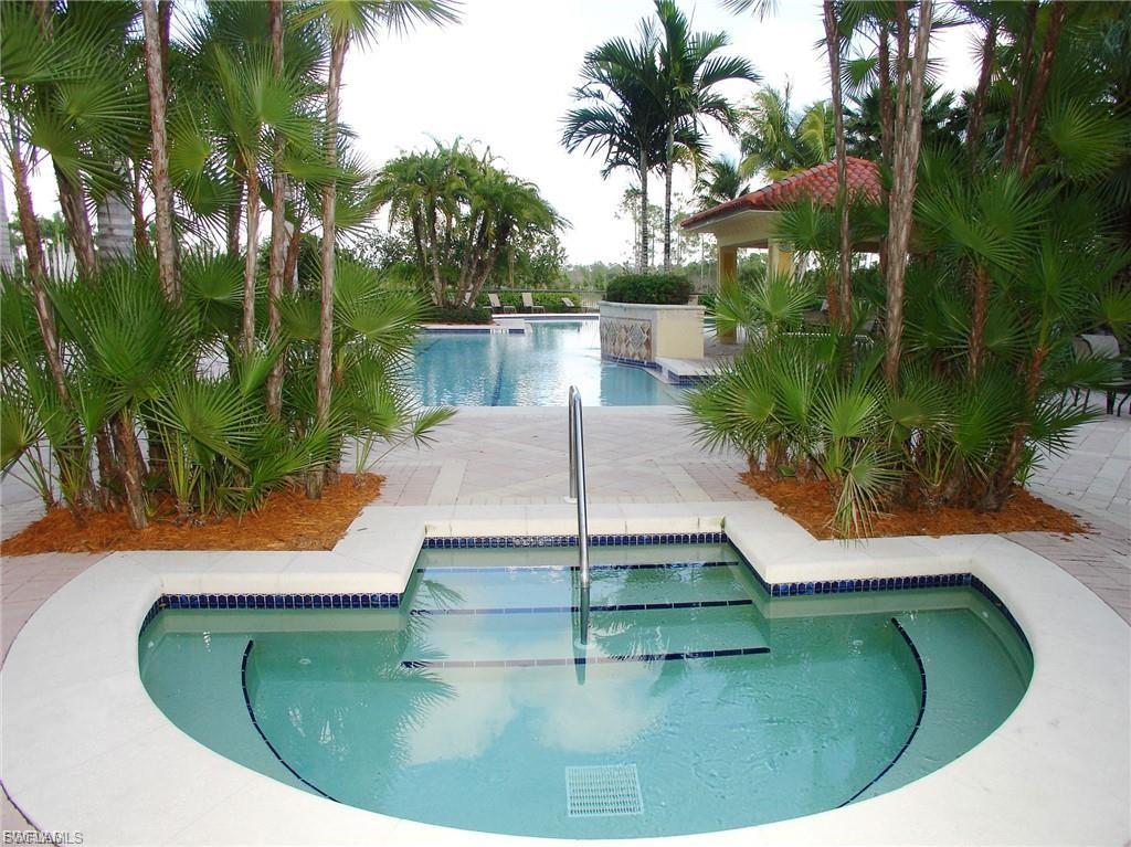 Community pool with a patio area