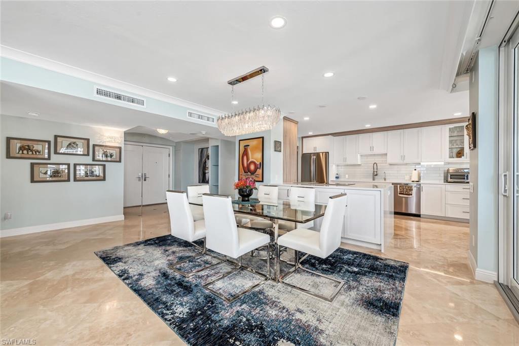 Dining area featuring a toaster, visible vents, and recessed lighting