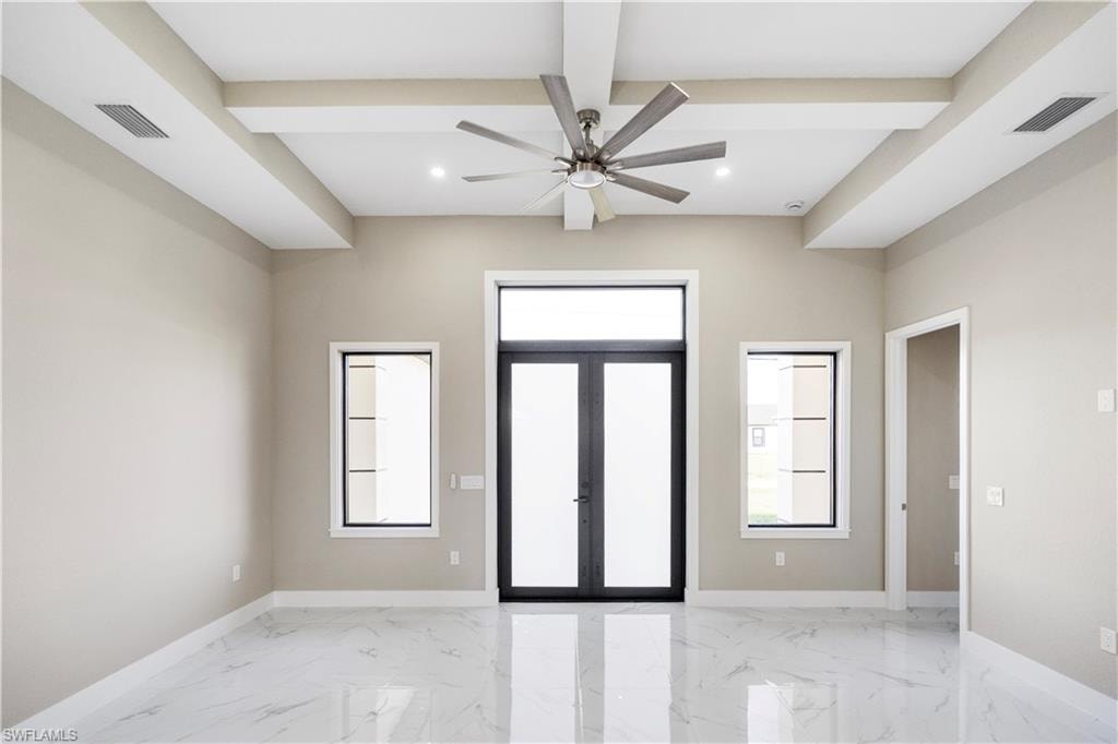 Foyer entrance featuring french doors, ceiling fan, recessed lighting, light marble finish floors, and coffered ceiling