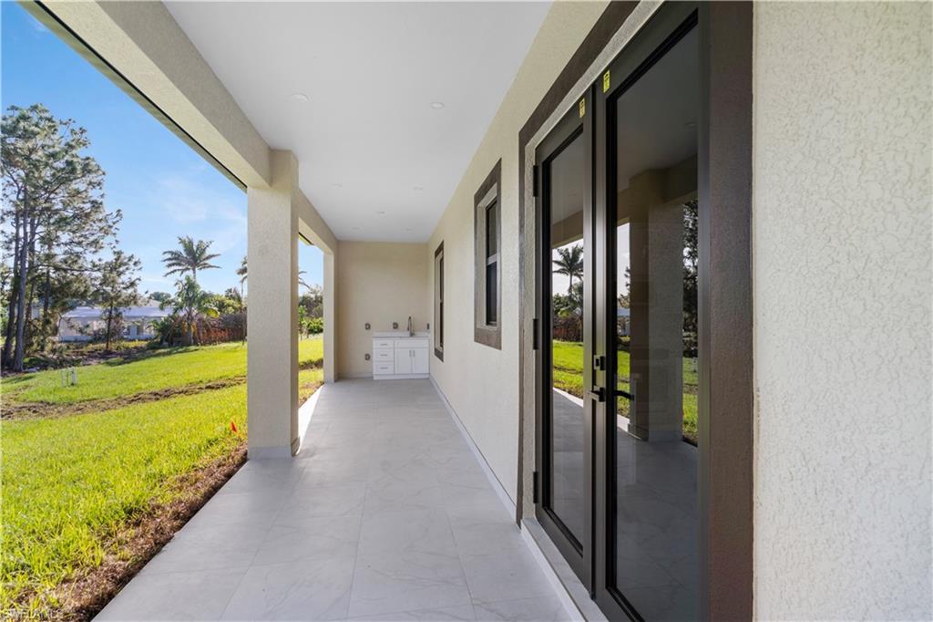 View of patio featuring french doors
