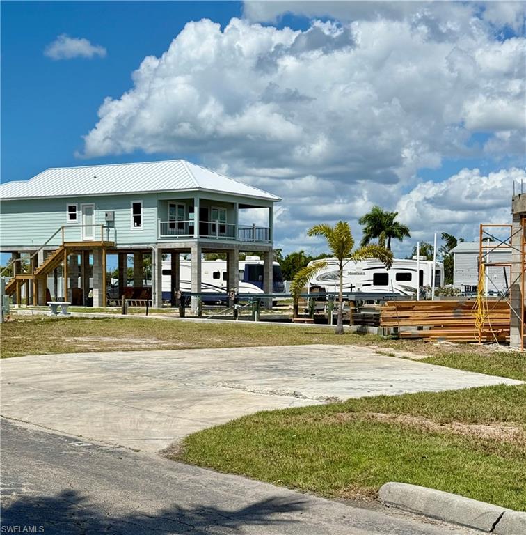 Build your lifted waterfront dream home!
