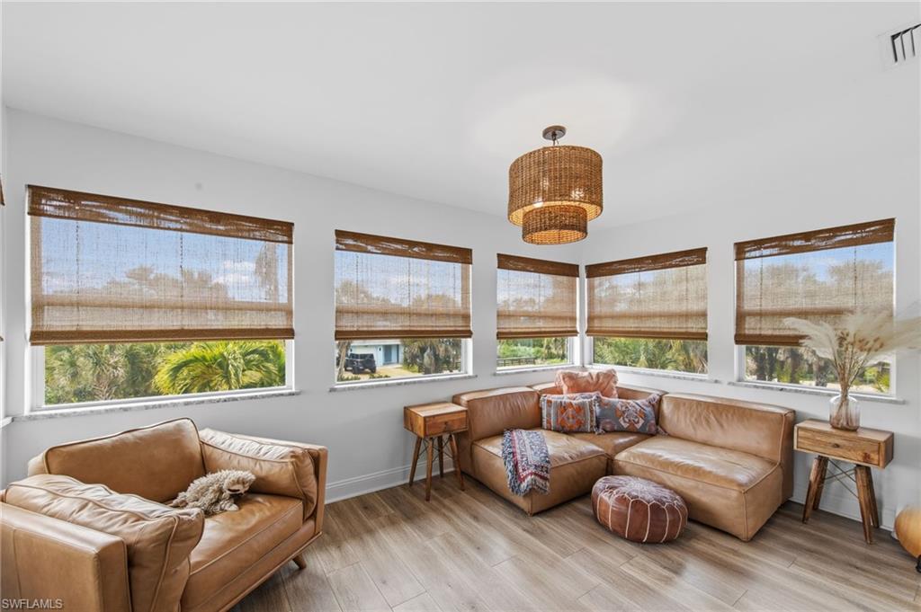 Sunroom featuring plenty of natural light
