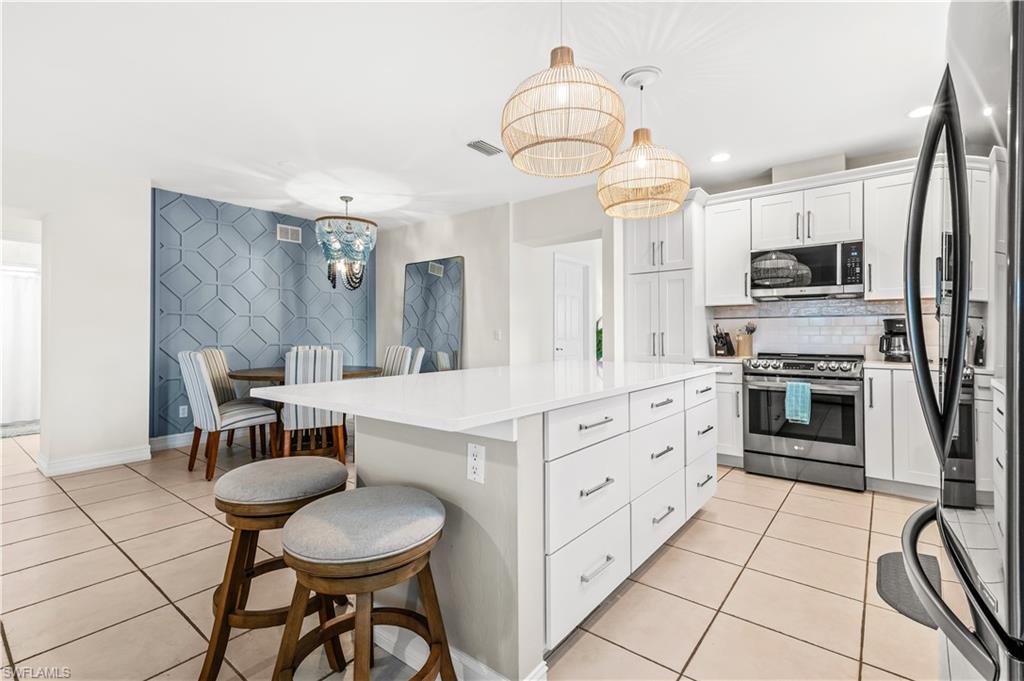 Hardwood-style flooring throughout