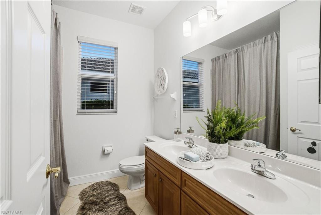 Adjacent 2nd bathroom is positioned between bedroom 2 and 3.