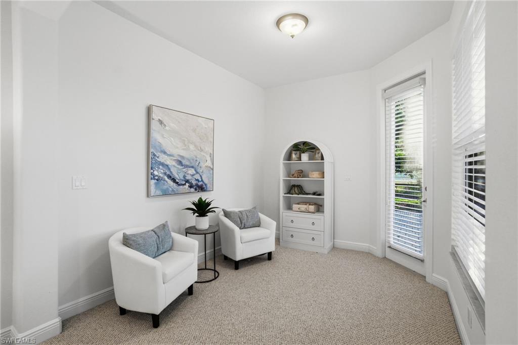 Bonus sitting room is situated just off of the primary bedroom.