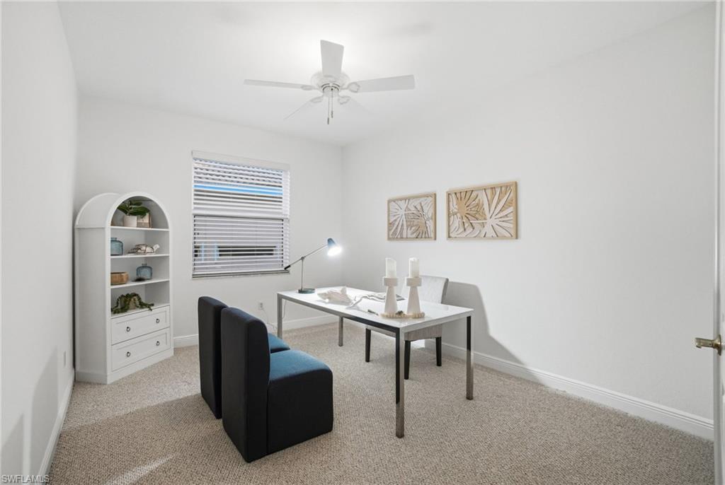 4th Bedroom is staged as a office.  Double French door privacy with wide entry point.