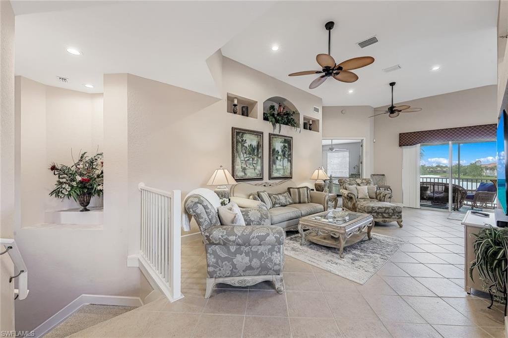 Interior stairway flows into the Great Rm space with open lake and sky visibility
