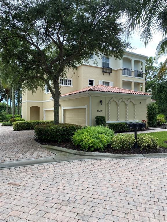 Mediterranean / spanish-style house featuring stucco siding, a garage, and driveway