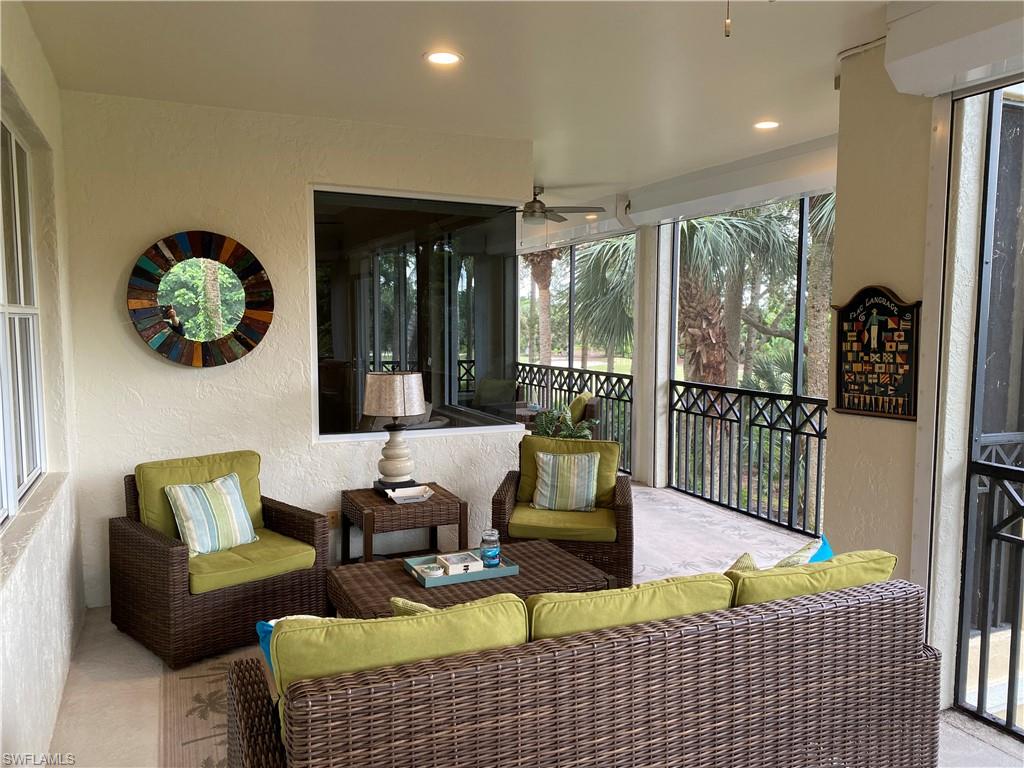 Sunroom / solarium featuring ceiling fan and outdoor seating
