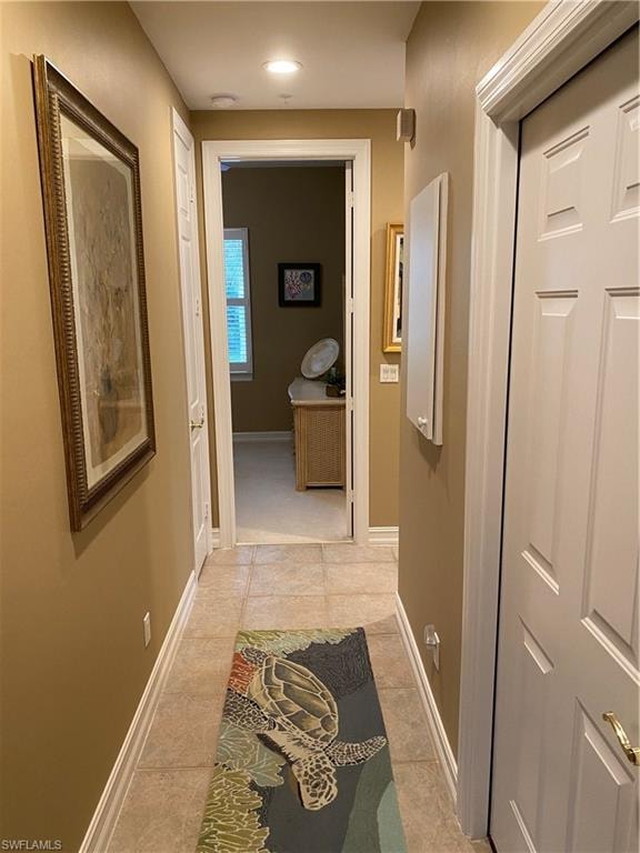 Hall featuring baseboards