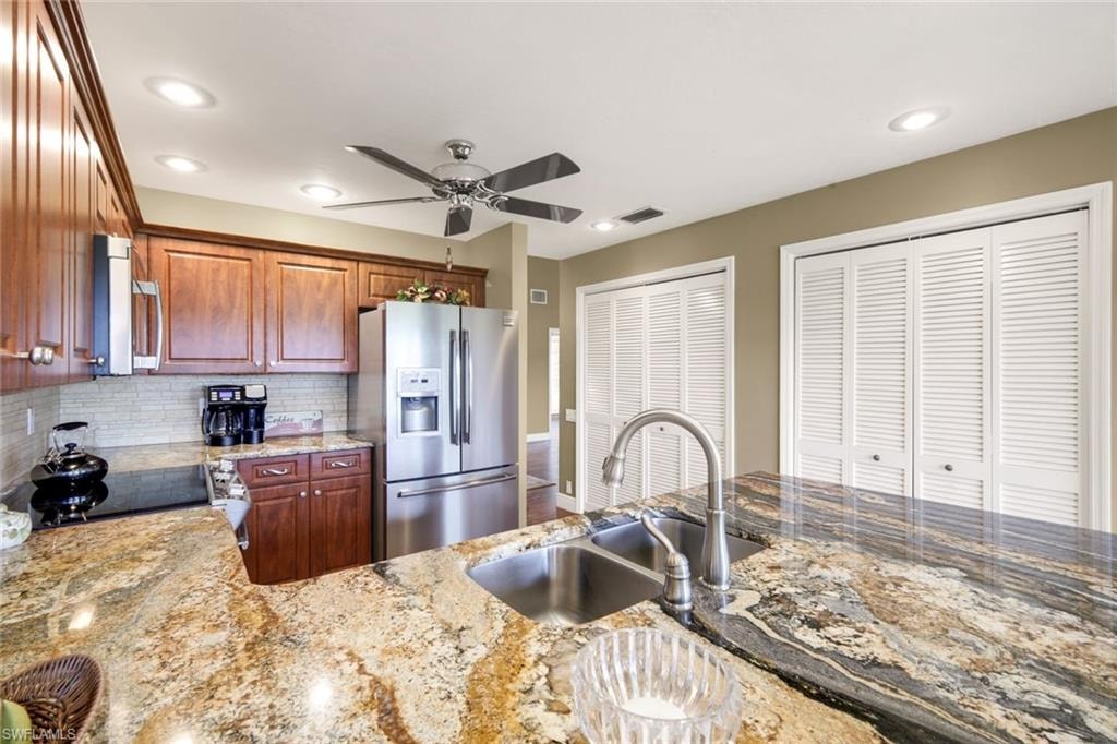 Wood Cabinetry, Upper Level Granite, SS Sink