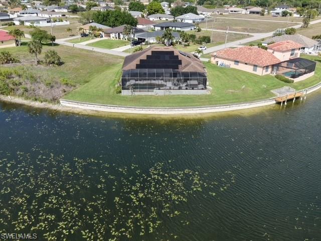 Aerial view of residential area with a large body of water