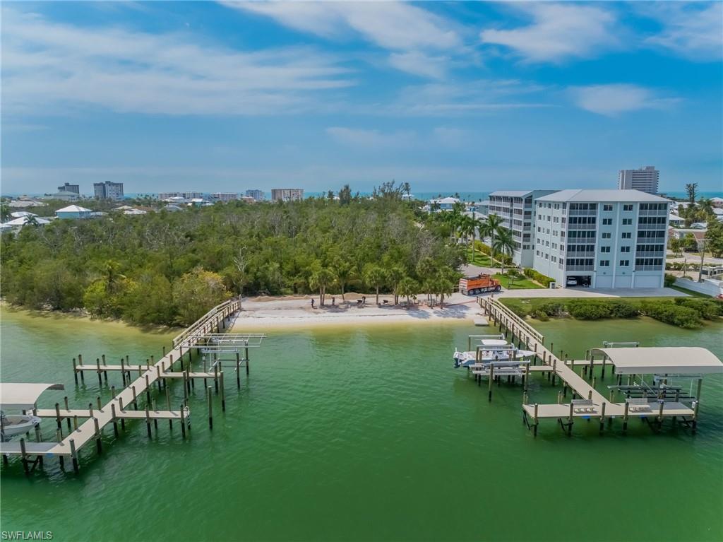 Two boat docks, private beach, and two buildings at Sea Grape Condo