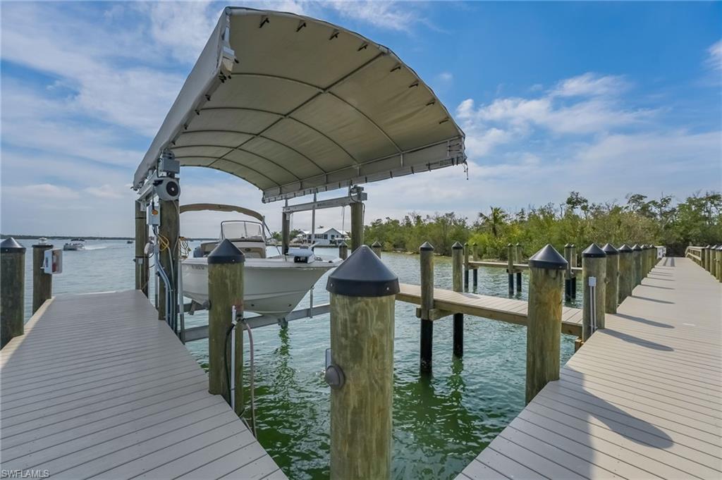 Private Boat Dock, Lift and Boat cover.
