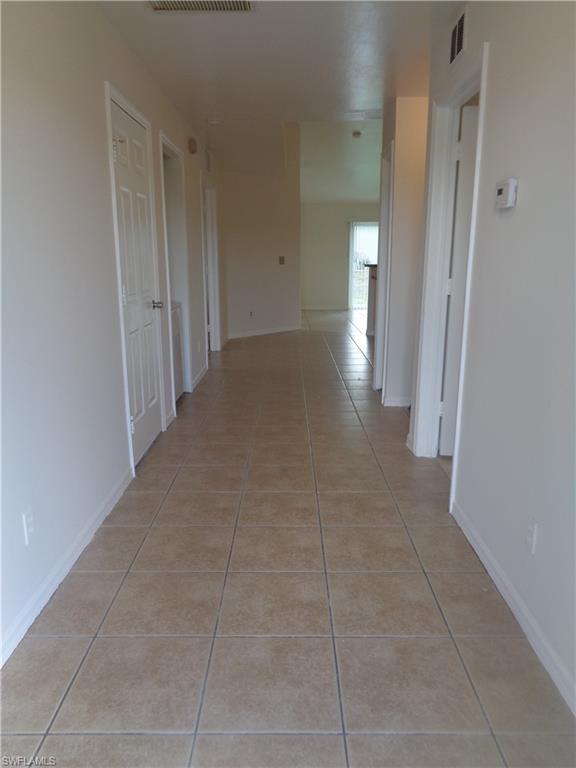 Entry featuring light patterned flooring