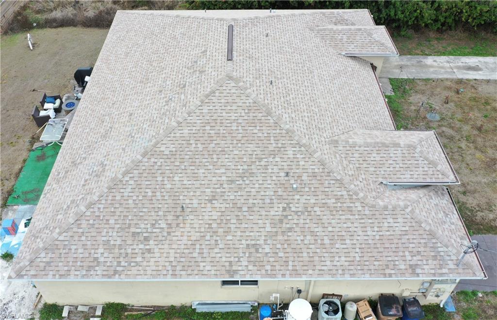 Left side aerial view of the duplex