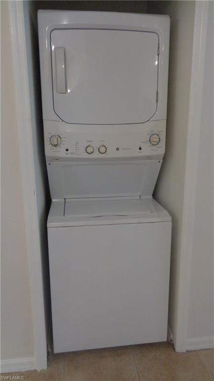 Laundry featuring stackable washer and dryer