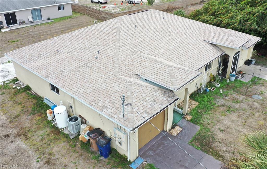 Left side aerial view of the duplex
