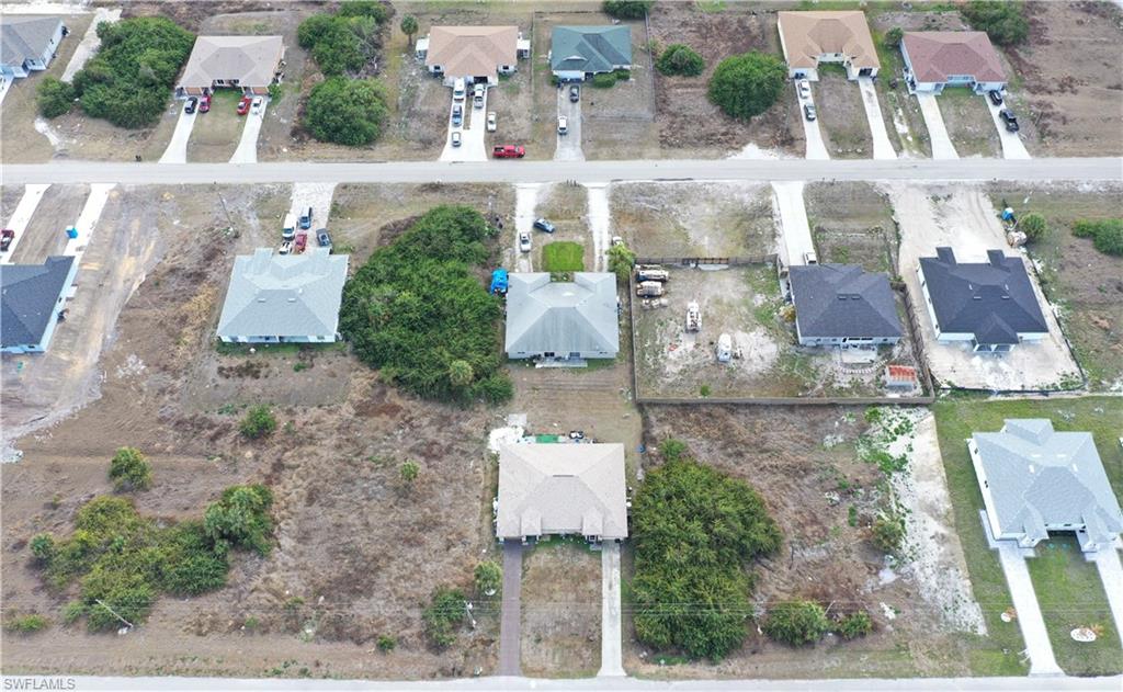 Aerial view of the duplex and suburban area