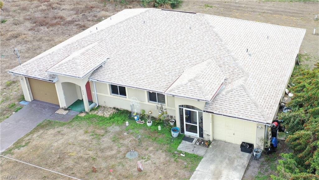 Aerial view of property and surrounding area