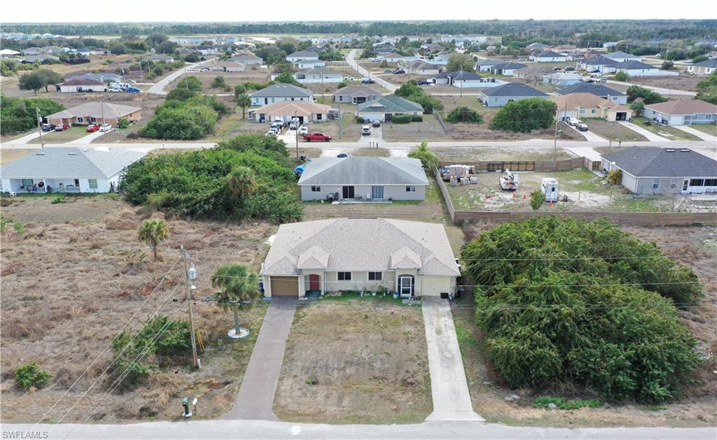 Aerial view of the duplex and suburban area