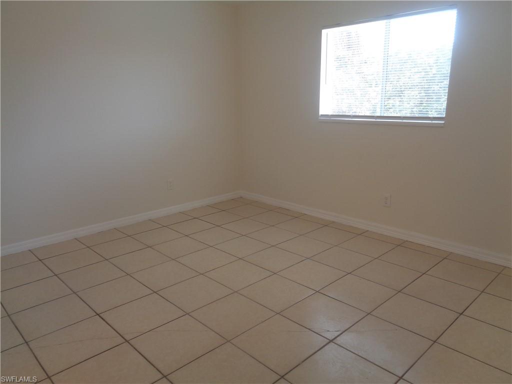 Master bedroom featuring light color tile floors