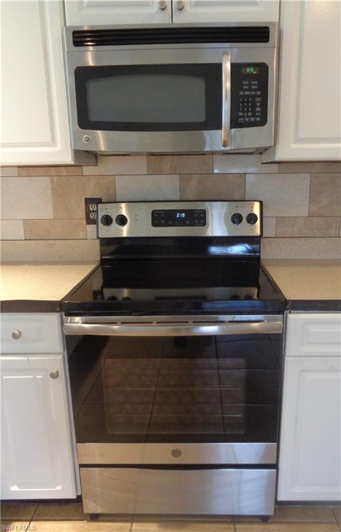 Stainless steel appliances: microwave and stove/oven