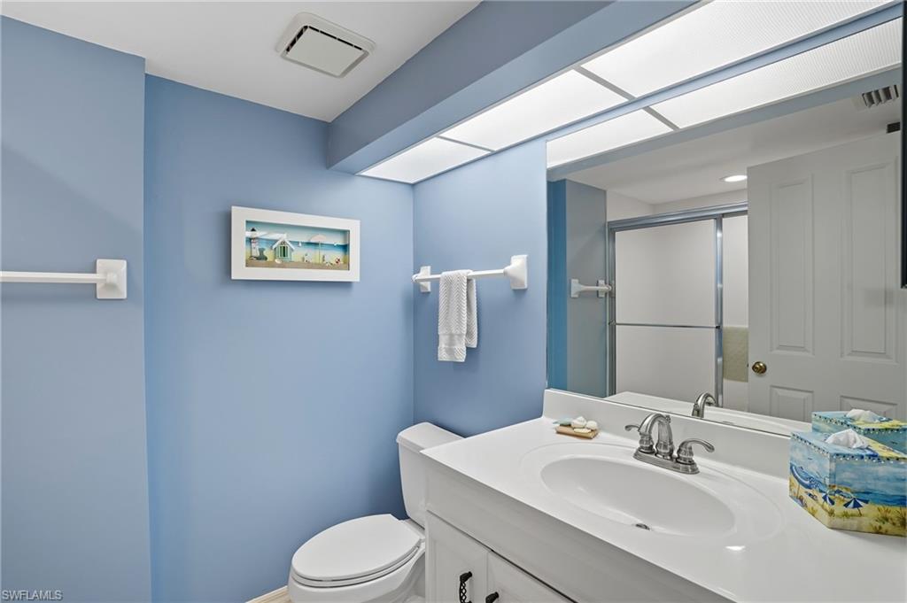 Bathroom with vanity and a stall shower - Virtually Edited Image