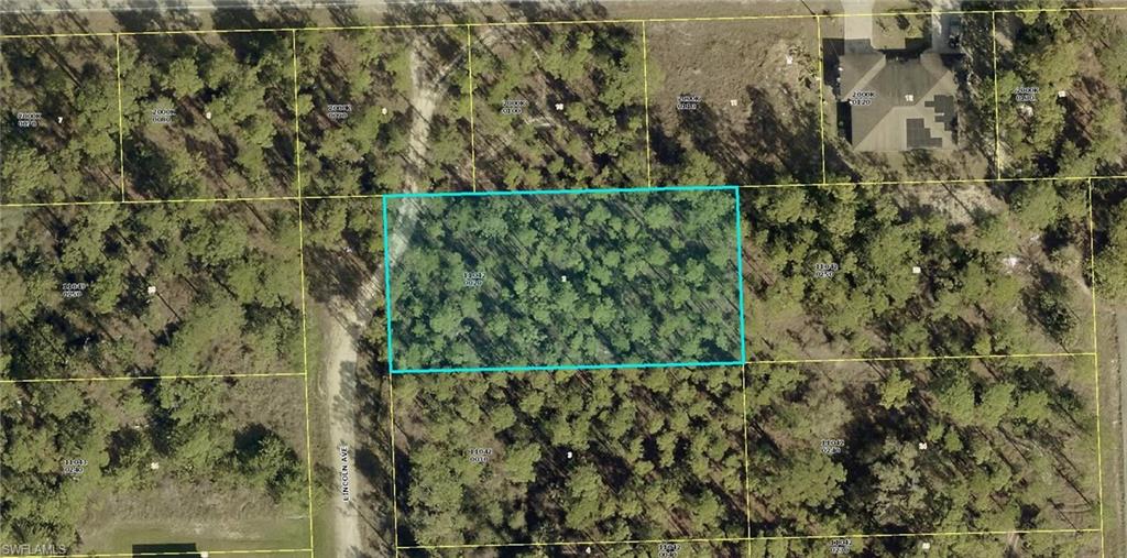 Aerial map of property and surrounding area with property parcel outlined
