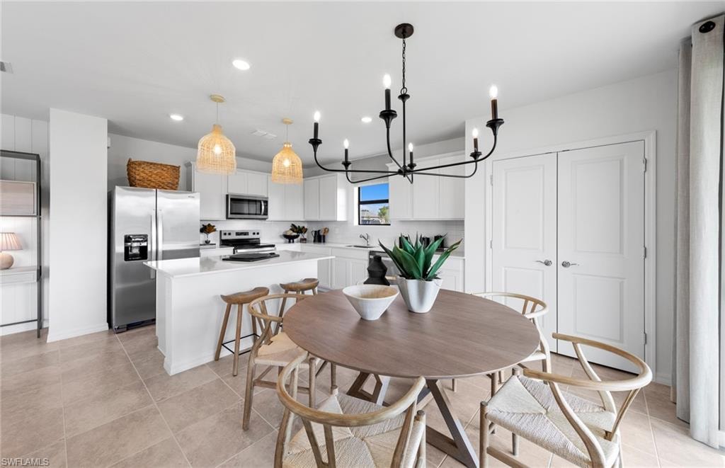 Photos are from a furnished model. Options for this home may vary.