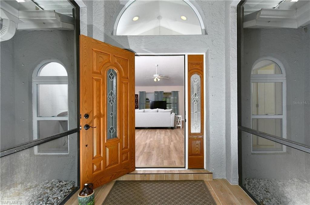 Foyer with a textured wall