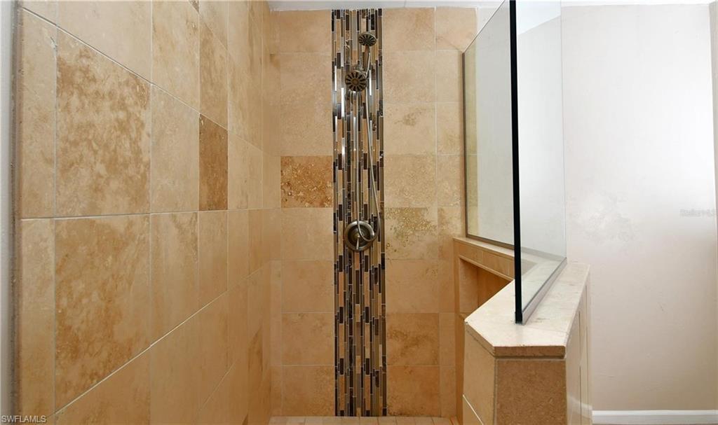 Bathroom with tiled shower