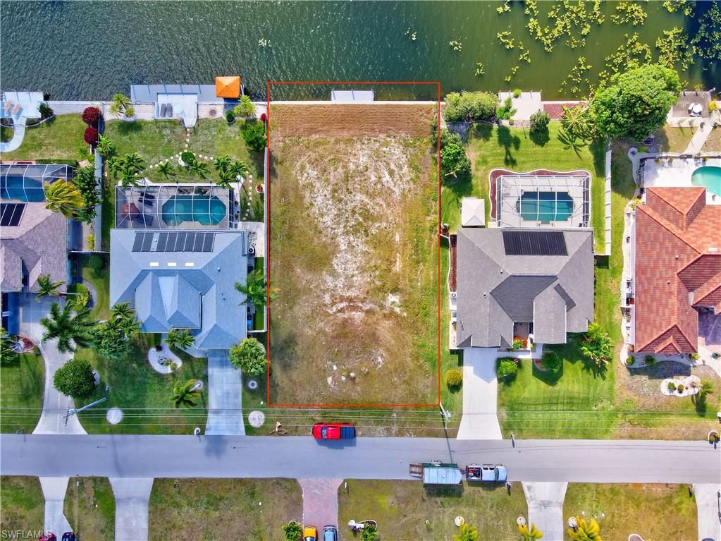 Aerial overview of property's location featuring property boundaries highlighted