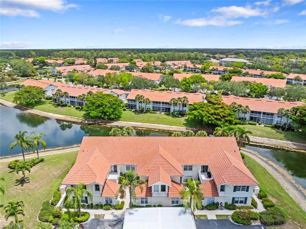 Private cul-de-sac lake view location with no thru-traffic at 4970 Deerfield Way, North Naples