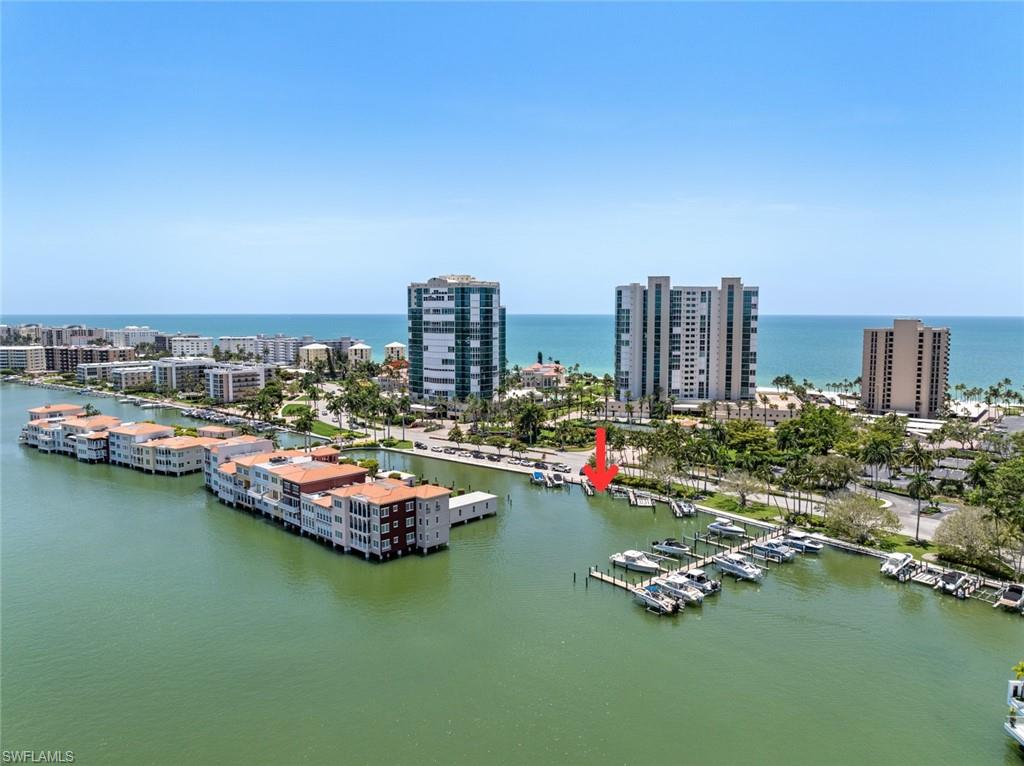Boat slip in Doctors Bay along Gulfshore blvd N with the Gulf in the background