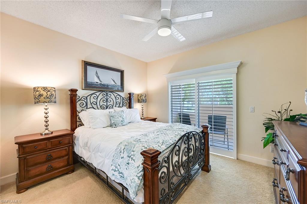 Guest Bedroom 1 with Sliders to Front Porch