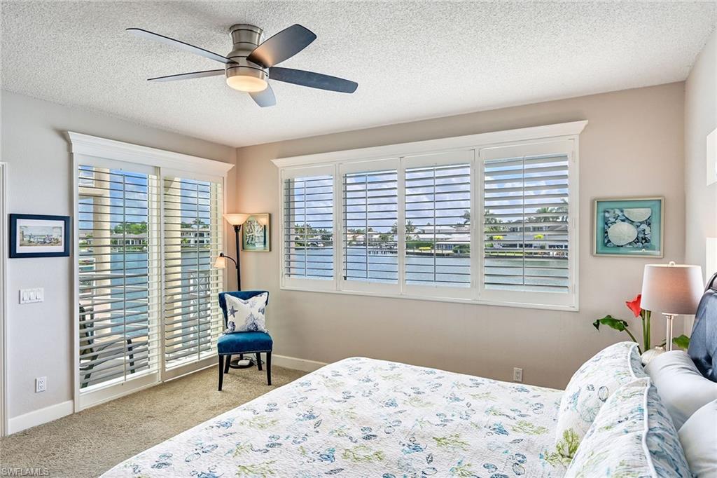 Primary Bedroom with Bay view and Patio Access