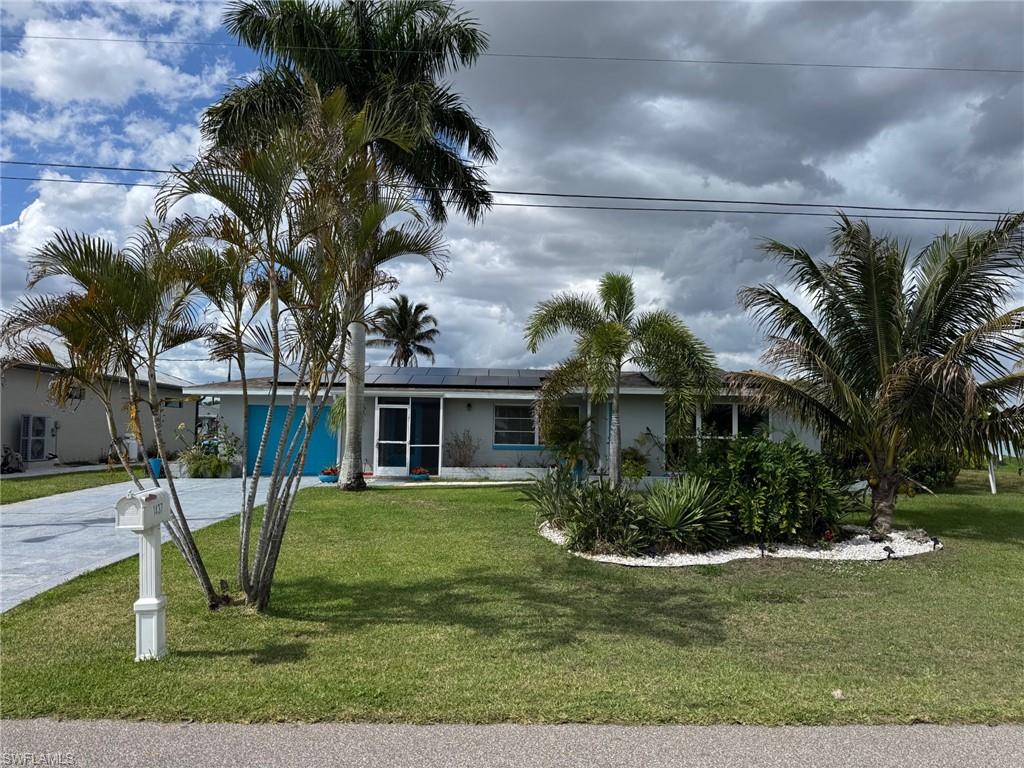 Location, curb appeal and notice the double wide driveway. Home also has solar panels for electric that will be paid off at closing.