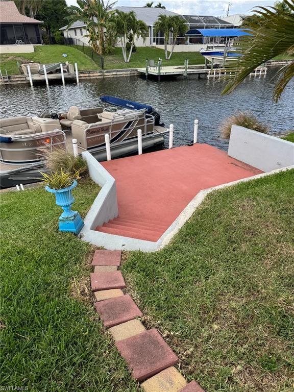 Enjoy your concrete dock and gulf access canal right in your back yard.