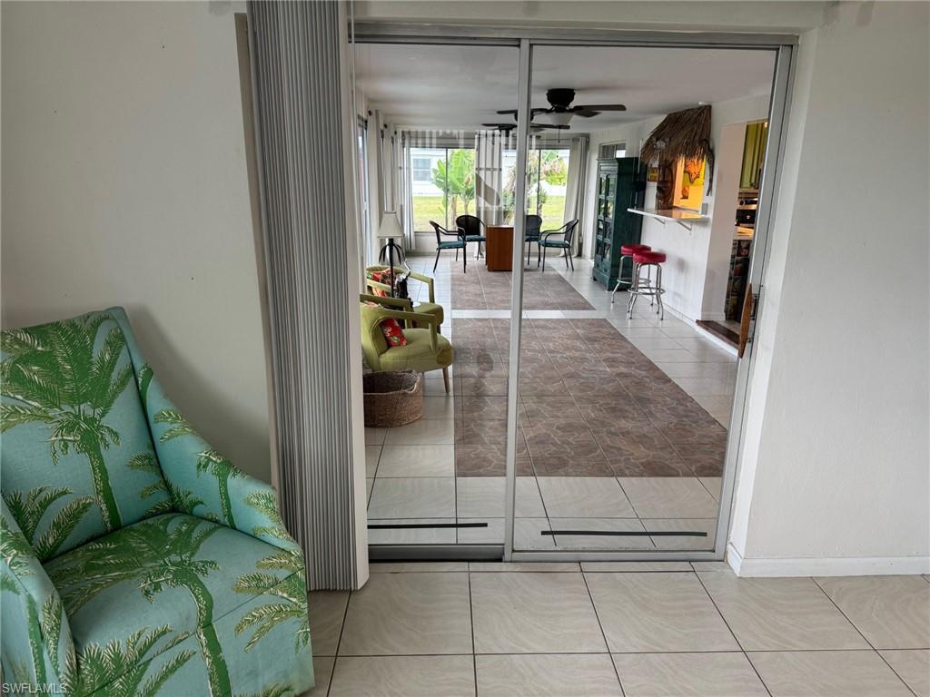 Sliding doors from the main bedroom looking into the sunroom.
