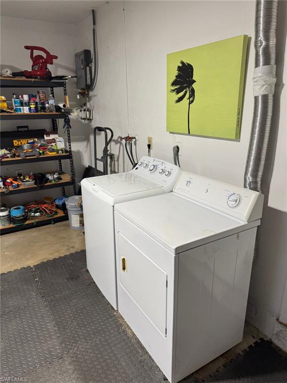 Notice the new tankless hot water heater, saves space and energy.  Nice laundry area in the garage.