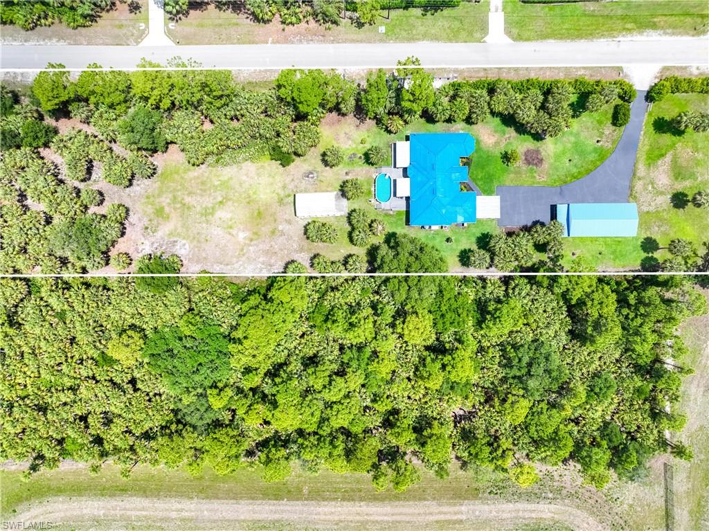 Top-down aerial view shows the home, detached garage, pool, driveway, and surrounding acreage.